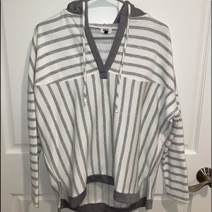 White and grey stripped Buckle sweatshirt, size XS! Fits like a normal M would!